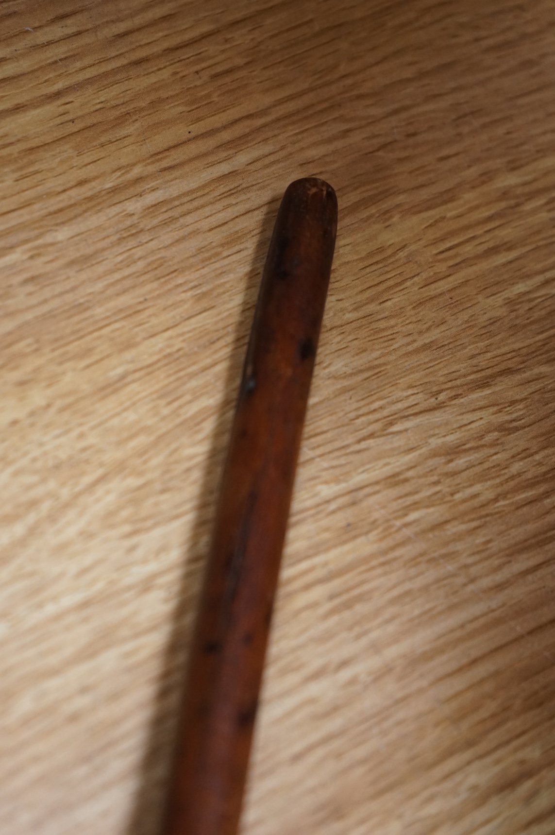 A Zulu Knobkerrie, late 19th century, Provenance - vendors grand father in law brought back from Africa when working in the Gold Coast late 19th/early 20th century. 51cm long.